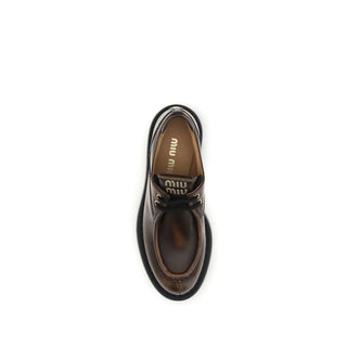 Miu Miu Brown Calf Leather Bos Taurus Platform Loafers